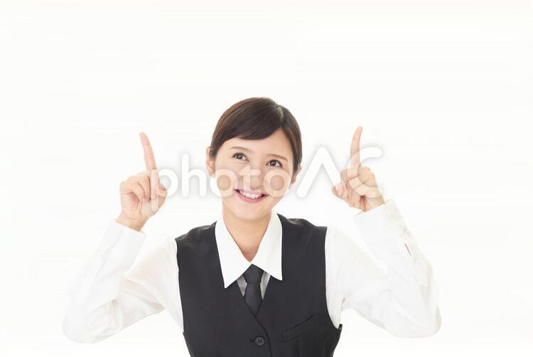 指示する笑顔のビジネスウーマン 女性,ビジネスウーマン,女の写真素材