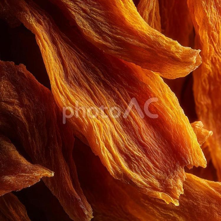 高精細なオレンジ色の乾燥果実皮 干し柿,マクロ,クローズアップの写真素材