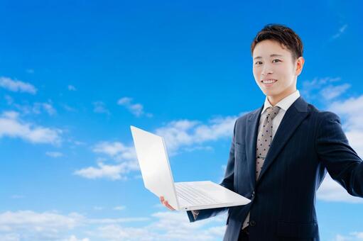 さわやかな空とビジネスマン ビジネスマン,男性,青空の写真素材