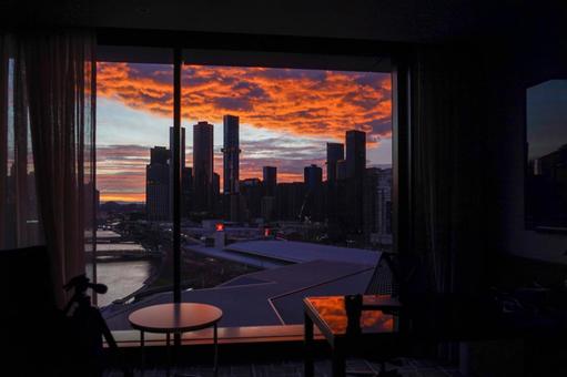 ホテルからのメルボルン夕景 夕焼け,オレンジの雲,高層ビルの写真素材