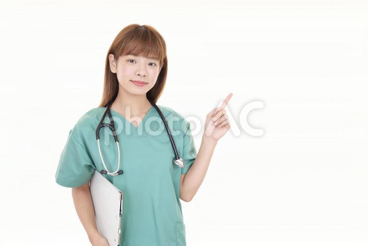 女医　指さす　案内 医師,女医,医者の写真素材