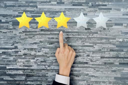 5段階中三つ星の評価 星,普通,評価の写真素材