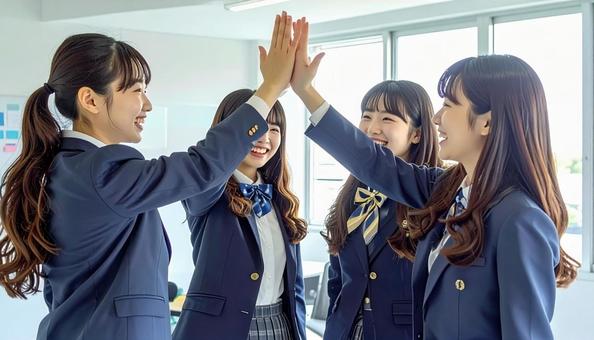 喜びを分かち合う学生 喜びを分かち合う学生の写真