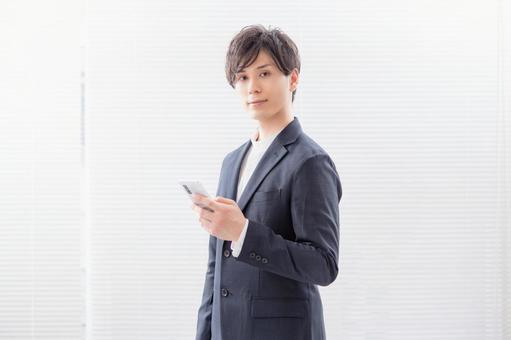 婚姻匹配的應用程序一位商人的男性形象, JPG 婚姻匹配的應用程序一位商人的男性形象, aplikasi kegiatan perkawinan, smartphone, perkawinan online, JPG