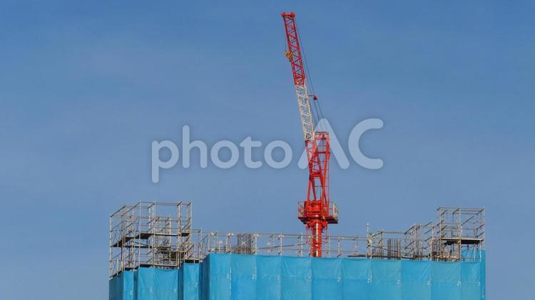 マンション工事現場　タワークレーン マンション工事,工事現場,タワークレーンの写真素材