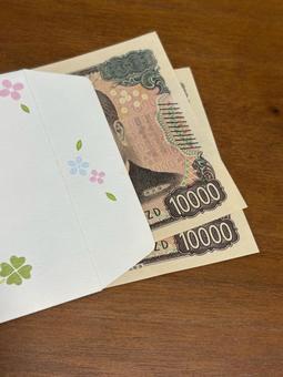 謝礼 封筒のお札 2万円 小遣い お礼 謝礼 封筒のお札 2万円 小遣い お礼 謝礼,一万円札,2万の写真素材