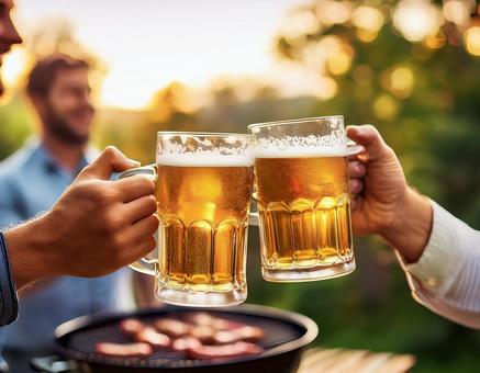 バーベキューでビール バーベキューでビールの写真