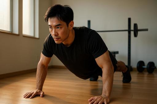 腕立て伏せをする男性 腕立て伏せをする男性の写真