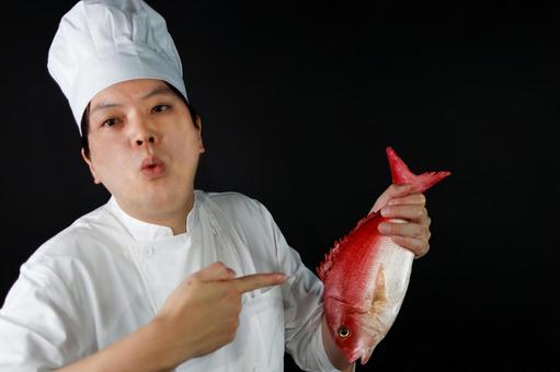 魚を持つ和食料理人 魚を持つ和食料理人 料理人,シェフ,調理師の写真素材