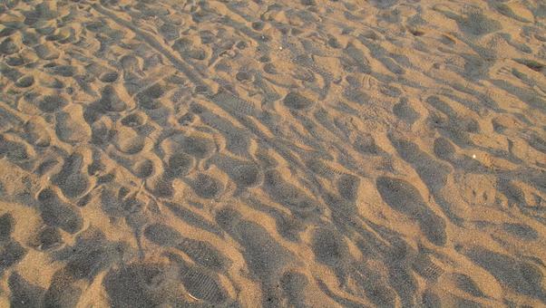 砂浜に残る足跡のテクスチャ 砂浜に残る足跡のテクスチャ 砂浜,足跡,テクスチャの写真素材