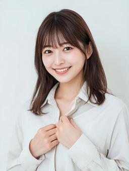 白いブラウス姿のビジネスウーマン 白いブラウス姿のビジネスウーマンの写真