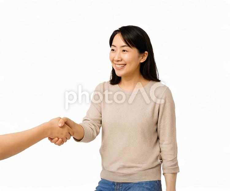 合意の握手を交わす女性 女性,笑顔,握手の写真素材