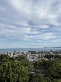 小田原城からみた相模湾① 雲,空,木の写真素材