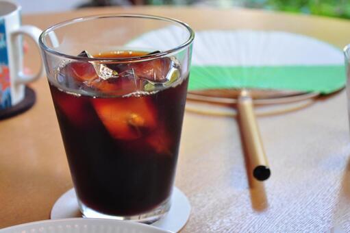 Cool in summer with iced coffee and fan, JPG Cool in summer with iced coffee and fan, JPG
