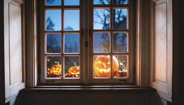 暗闇に光るジャック・オー・ランタンの写真