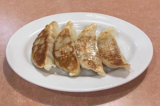 焼き餃子 焼き餃子 焼き餃子,ギョウザ,肉餃子の写真素材