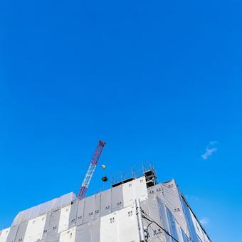 クレーンと工事中のビル クレーン,ビル,空の写真素材