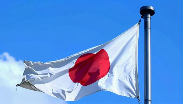 風にたなびく日本の国旗 風にたなびく日本の国旗の写真