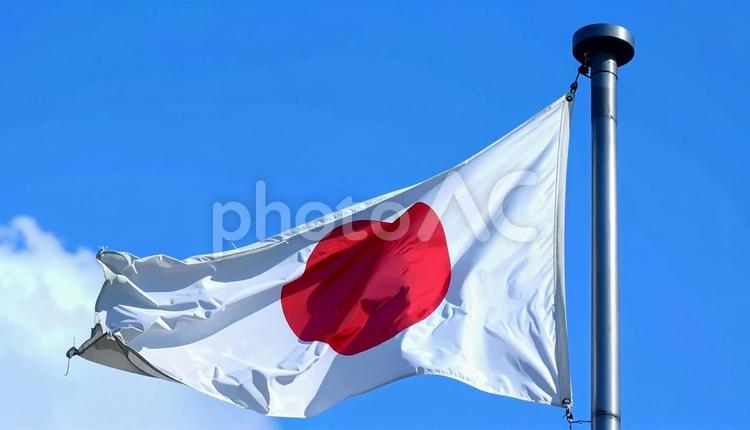 風にたなびく日本の国旗 国旗,日本,ジャパンの写真素材