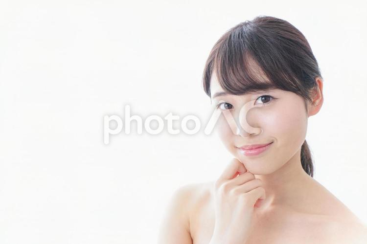 悩む女性・美容イメージ てかり,女の子,日焼けの写真素材