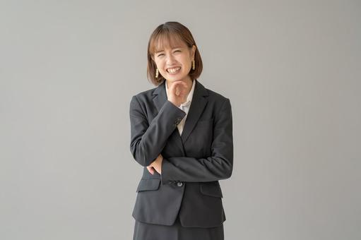 笑顔のビジネスウーマン 笑顔のビジネスウーマン 女性,笑顔,スーツの写真素材