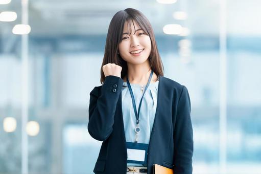 ガッツポーズをする女性・ビジネスウーマン ガッツポーズをする女性・ビジネスウーマン 女性,ガッツポーズ,笑顔の写真素材