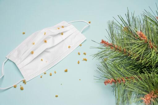 白いマスクと飛散した花粉のイメージ背景 マスク,花粉,花粉症の写真素材