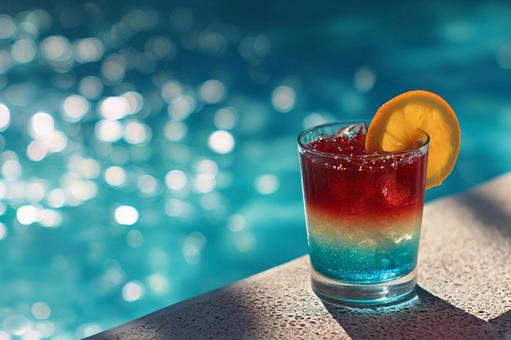 トロピカルカクテルとオレンジガーニッシュの写真