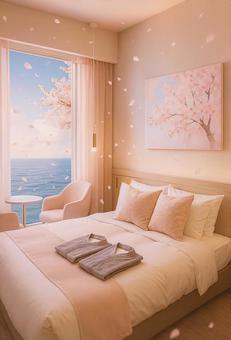オーシャンビューと桜に包まれたホテルの写真
