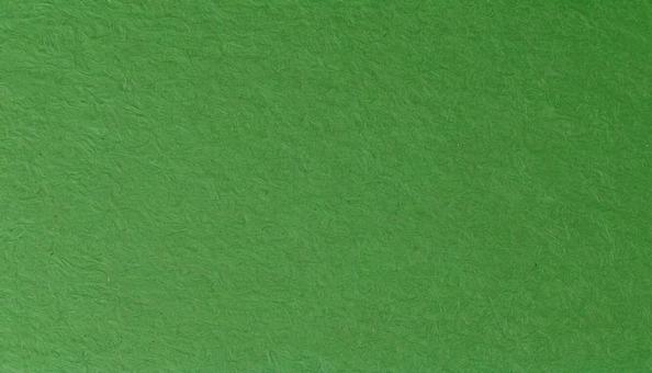 くすんだ緑の壁紙の写真