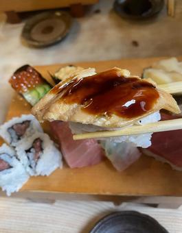 Boiled conger eel nigiri sushi with sauce, JPG