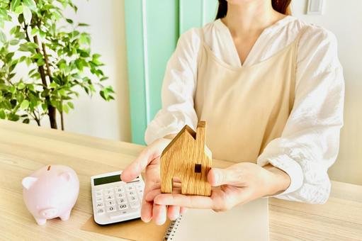 A woman thinking about home and money, JPG A woman thinking about home and money, JPG