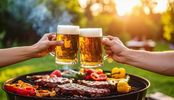 ビールで乾杯するバーベキュー ビールで乾杯するバーベキューの写真