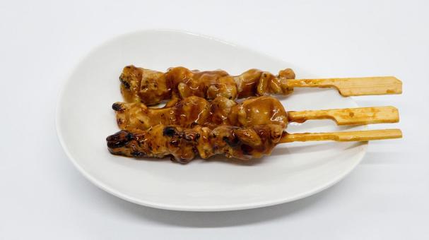 焼き鳥の串 たれ 白背景 焼き鳥の串 たれ 白背景の写真