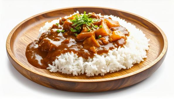 木製プレートに盛り付けられたカレーライス 木製プレートに盛り付けられたカレーライスの写真