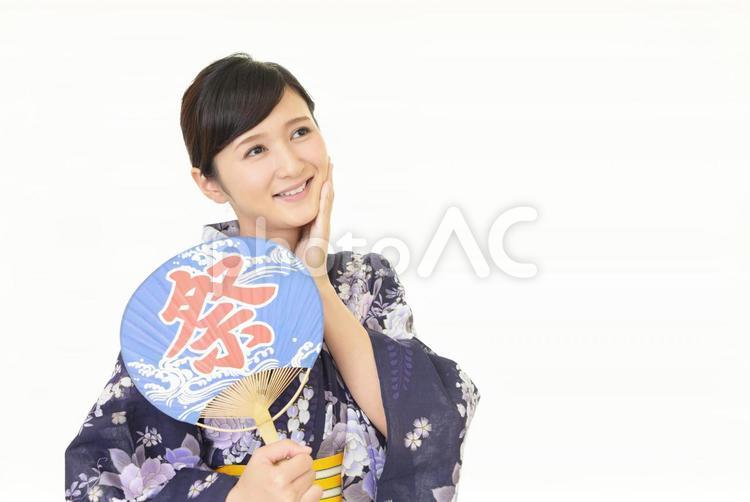 浴衣を着た笑顔の女性 女性,浴衣,着物の写真素材