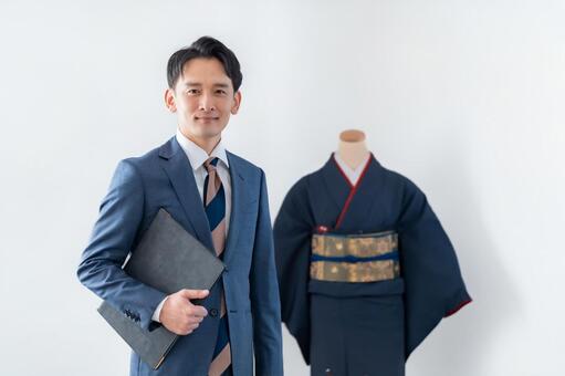 着物を買取するスーツを着た男性 ビジネスマン,男性,スーツの写真素材