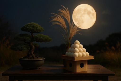 盆栽と一緒に飾られた月見団子 盆栽と一緒に飾られた月見団子の写真