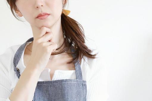 悩みを抱える主婦 悩み,主婦,女性の写真素材