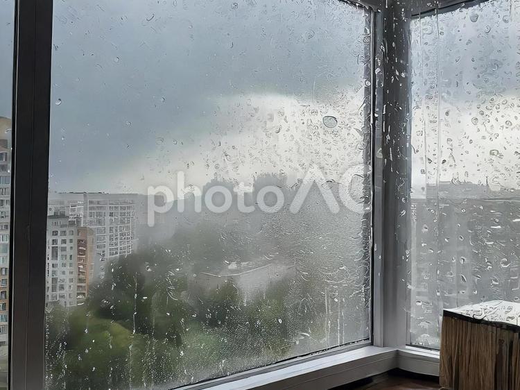 雨に濡れた窓ガラス・景色 雨,窓ガラス,濡れたの写真素材