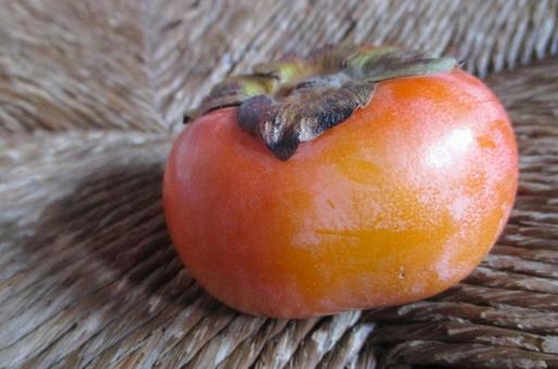 次郎柿 柿,カキ,オレンジ色の写真素材