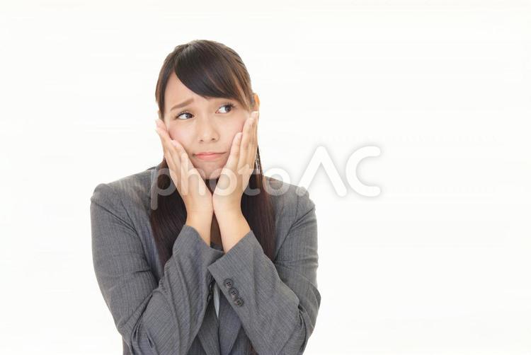 困惑した表情のビジネスウーマン 女性,ビジネウーマン,女の写真素材