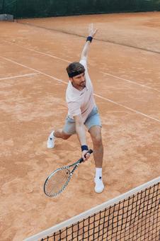 白い靴を履いた男性のプレーシーン 男性,外国人,テニスの写真素材
