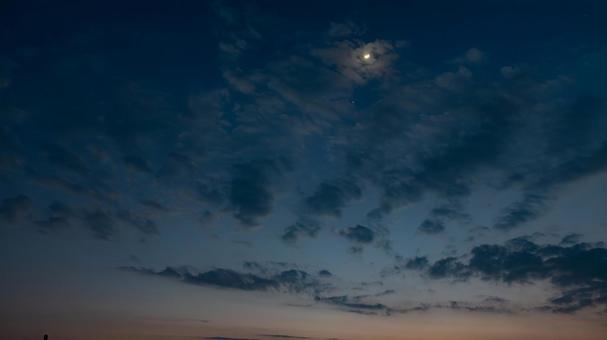 Evening view of scale clouds and a crescent moon, JPG Evening view of scale clouds and a crescent moon, JPG