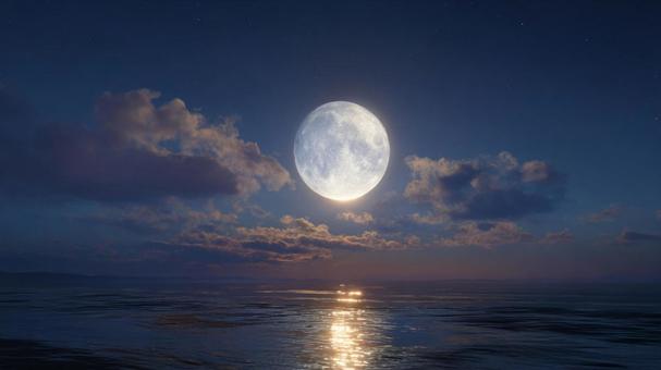 神秘的な満月が照らす夜の海 神秘的な満月が照らす夜の海の写真