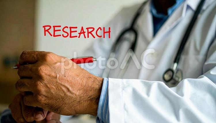 研究「Research」と書く白衣の男性 リサーチ,英単語,医者の写真素材