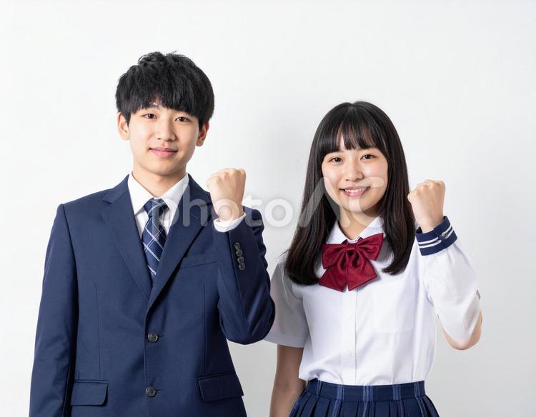 ガッツポーズする男子生徒と女子生徒 高校生,中学生,ガッツポーズの写真素材