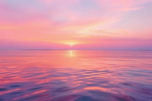 夕焼けに染まる海の水平線 夕焼けに染まる海の水平線の写真
