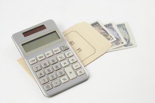 給与計算 給与計算 電卓,計算,給料袋の写真素材