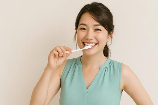 歯磨きする女性 口臭・虫歯・歯周病予防2 歯磨きする女性 口臭・虫歯・歯周病予防2の写真